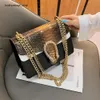 Cross-border atacado marca de moda bolsas saco das mulheres novo um ombro em relevo cobra corrente estilo estrangeiro pequeno