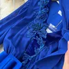 フランスのハイエンドスパンコール蝶ネクイロングスリーブドレス女性ウエスト気質ビッグスイングロータスリーフロングスカート