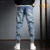 Pantalon de jeans pour hommes harem pantalon de cowboy masculin épissé pour les hommes cargo haruku baggy empilé par un denim original de style coréen