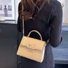 Shop design handbag wholesale retail Simple and Portable Trendy Small Bag with Palm Pattern Cowhide Tote Collar Niche Shoulder