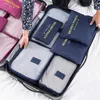 Sacs de rangement 6pcs / Set Voyage Essentials Vêtements Étanche Portable Organisateur de bagages Cube d'emballage 9 couleurs Stock local