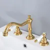 Rubinetti del lavandino da bagno a bacino oro lucido in ottone in ottone a doppia maniglia 3 fori e tocco di acqua fredda LNF982