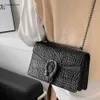 Grenzüberschreitende Großhandelshandtaschen der Modemarke Neue Damentasche Modekette Straddle Krokodilmuster Vielseitige One-Shoulder-Ladybags