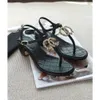 Luxurys designer sko man sandal wnoam glida läder lammskinn thong sandal mode sexig strass metall imitation pärlor tofflor