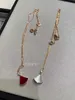 V gold high version small skirt Necklace womens 18k rose gold natural white Fritillaria light luxury high sense small outrageous waist collarbone chain