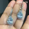 Boucles d'oreilles pendantes de luxe pour femmes, longues ovales en cristal de Zircon rouge, bijoux de fiançailles, cadeaux de mariage, accessoires