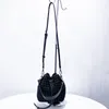 Sacs à bandoulière tissés à la main en nylon avec cordon de serrage pour femmes Sacs à main de luxe Designer Sac à main 2024 dans Casual Hollow Mini Bucket Sac à bandoulière