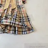 2024 Sommer Mädchen Bogen Plaid Kleider Kinder Rüschen Fly Sleeve Gitter Kleid Adrette Kinder Baumwolle Designer Kleidung S1228