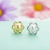 Orecchini a bottone Micro Set Auger Shell Pearl Ha accessori per fiori femminili in edizione Han