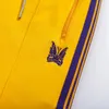 Calças masculinas agulhas awge casual ao ar livre 1:1 sweatpants roxo borboleta bordado lado webbing listrado zíper bolso amarelo calças