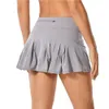 Tenis plisowany spódnice joga gym spódnica kobiet sportowy ubrania ubrania fiess bieganie golfowe spodnie z tyłu talii kieszeń zamek 23ss