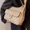 Source Factory Pacchetto di alta qualità Xiaoxiangfeng Borsa da donna di moda Autunno / inverno 2024 Nuova trama Catena a griglia di diamanti Borsa versatile con una spalla per pendolari