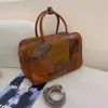 Grenzüberschreitende Großhandel Modemarke Handtaschen Milard Boston Bowlingtasche für Frauen neue Kapazität Pendler Handheld Schulter