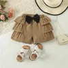 Kledingsets Little Girl Summer Set Mouw Frill Trim Tops Elastische taille boog gelaagde shorts zuigeling peuter outfit