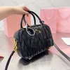 Prodotto caldo Borsa di design Totes Borsa a tracolla Top Portatile in metallo Tracolla regolabile staccabile Pelle Borsa da donna a spalla incrociata in morbida pelle di capra