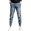 Pantalon de jeans pour hommes harem pantalon de cowboy masculin épissé pour les hommes cargo haruku baggy empilé par un denim original de style coréen