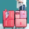 Sacs de rangement 6pcs / Set Voyage Essentials Vêtements Étanche Portable Organisateur de bagages Cube d'emballage 9 couleurs Stock local