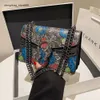 Borsa da donna transfrontaliera all'ingrosso di marca di moda Borsa da donna Nuova moda stampata a tre colori con catena a spalla piccola multifunzione quadrata