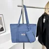 トートズの女性コーデュロイトートバッグカジュアルショルダー財布大容量ハンドバッグ冬の通勤と汎用性