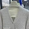 Cardigan lavorato a maglia monopetto in seta brillante in stile francese, giacca di media lunghezza con scollo a V, alla moda e d'atmosfera