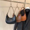 Pas cher en gros liquidation limitée 50% de réduction sac à main avancé nouveau sac de lune femmes cette mode polyvalente sous les bras Dumpling unique épaule Wtern style bandoulière