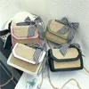 Axelväskor kvinnor halmväska bowknot kedja liten handväska läder crossbody för designer 2024