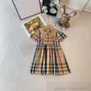 British Style Girls Plaid Dresses Summer Children Stripe Bow Lapel Short Sleeve Pleated Dress Preppy Style Kids Cotton Designer Clothes S1228