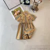 British Style Girls Plaid Dresses Summer Children Stripe Bow Lapel Short Sleeve Pleated Dress Preppy Style Kids Cotton Designer Clothes S1228