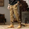 Pantalon homme printemps automne poches zippées avec élastique fier solide plissé vêtements de sport décontractés cheville attaché lanterne pantalon Vintage