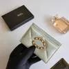 Mens mode läderkorthållare myntväska lady lyxig designer mini kort plånbok nyckel plånbok plånbok kvinnors toppkvalitet koppling svarta små passhållare nyckelpåse