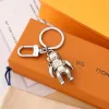 Louiseviution Keychain Car Key chain Solid color monogrammed Keychains Fashion Leisure astronaut Men Women Bag Pendant Accessories with box 2 options good nice