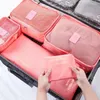 Sacs de rangement 6pcs / Set Voyage Essentials Vêtements Étanche Portable Organisateur de bagages Cube d'emballage 9 couleurs Stock local