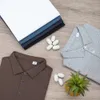Haut de gamme Double face coton couche creuse col de chemise Polo hommes à manches courtes T-shirt couleur unie affaires Z368 {catégorie}