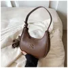 Goedkope Groothandel Beperkte Opruiming 50% Korting Handtas Geavanceerde Nieuwe Maan Tas Dames Deze Mode Veelzijdige Onderarm Dumpling Enkele Schouder Wtern Stijl Crossbody