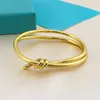 AA Designer Charm Bangle Bracelet TifanT Love Knot Bracelet Woven Rose Gold Non fading Simple Bow Wrapped Smooth Buckle Knot Bracelet BWZ2