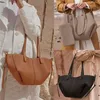 Üst omuz çantaları Fransız tasarımcı çanta tote çanta kadınlar büyük deri kapasite alışveriş çantası 240311