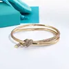 AA Designer Charm Bangle Bracelet TifanT Love Knot Bracelet Woven Rose Gold Non fading Simple Bow Wrapped Smooth Buckle Knot Bracelet W2NN