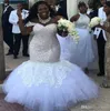 Plus Size Mermaid Wedding Dresses 2019 Modest Off Shoulder African Lace Applique Bridal Gowns Pärlade full längd Beach Garden Wedd3142745