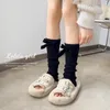 Meias femininas lolita jk perna aquecimento y2k primavera e outono arco feminino coreano longo tubo quente moda meias de crochê