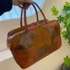 Grenzüberschreitende Großhandel Modemarke Handtaschen Milard Boston Bowlingtasche für Frauen neue Kapazität Pendler Handheld Schulter