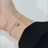 Modeontwerp bedelarmbanden zilveren sen s925 zilveren olijfketen ketting contrast armband met minimalistische en elegante stijl unieke ontwerp bellhangende asymmetrische br