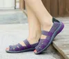 夏のデザイナー女性弾性バンドサンダル手織りの靴