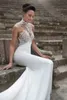 Boho Garden Mermaid Wedding Dresses Gorgeous Beading Pearls High Halning med tåg Slim Fit Backless Bride Robes de Mariee Yd