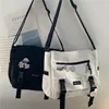 Torby na ramię harajuku wszechstronne płótno kobiety crossbody solidny kolor flip flip swobodne torebkę nastolatki torebka messenger torba