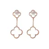 Fashionabla och lyxiga klöver örhängen märke örhängen designer för kvinnor klassiska charm hängande örhängen titanium stål designer smycken