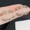 Orecchini di design di alta qualità Orecchini con lettere di diamanti Gioielli di marca da donna di lusso Orecchini in argento 925 con acciaio inossidabile Regali di compleanno per donna Design di marea