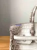 حقيبة حمل من الهيمالايا تمساح اليد الأصلية جميع خيط الشمع اليدوي خياطة BK25 Himalayan Crocodile Skin Bag platinum for Women Logo Hbuo1n