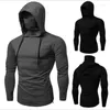 Camisetas para hombre Traje de fitness Sudadera con capucha periférica Camiseta de manga larga con capucha Color sólido informal Versátil