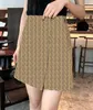 24 женские юбки Короткая полуюбка в стиле ретро с двойным цветком в современном стиле ретро и дизайном с разрезом по подолу 318