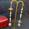 Branddesigner-pendiente viuda de emperatriz occidental, aretes con perlas, hombro francés, barrido, planeta largo, gotas de agua, pendientes de aguja de plata